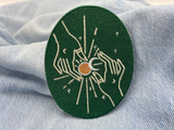 Mondfinsternis Patch auf blauer Jeans