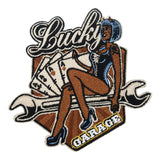 Brauner Biker Patch mit Teufelfrau vor vier Assen