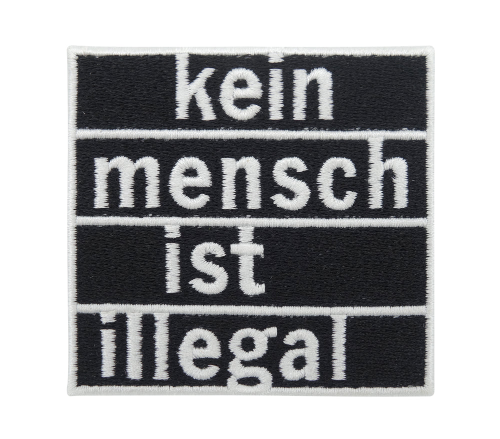 Schwarzer "Kein Mensch ist illegal" Patch