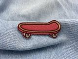 Skateboard Patch auf blauer Jeans