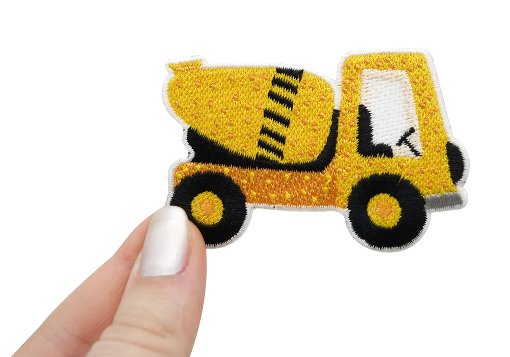 Betonmischer Patch gehalten von einer Frauenhand