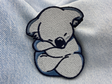 Koala Patch auf heller blauer Jeans