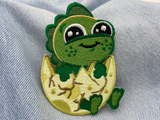 Baby Dino Patch auf blauer Jeans