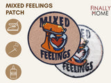 Vorder- und Rückseite des Patches, mit Bügelfolie. „Finally Home“ Logo und Nutzungsoptionen: Aufbügeln, Aufnähen, Aufkleben mit Textilkleber