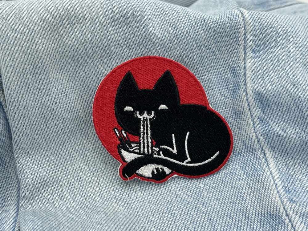 Katzen Patch auf blauer Jeans