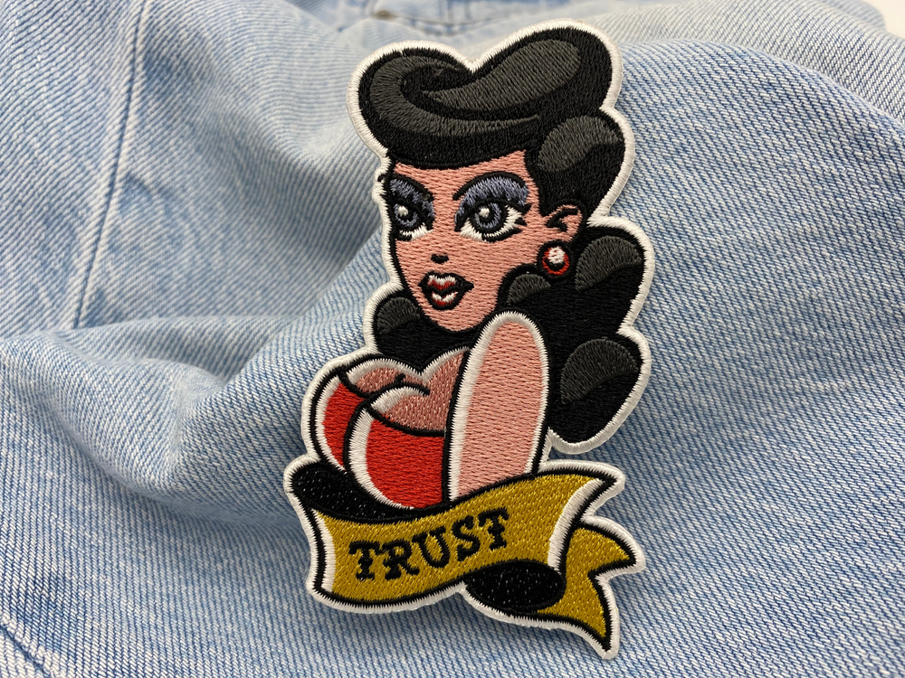 Sexy Frau Patch auf blauer Jeans
