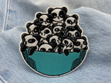 Pandabären Patch auf hellblauer Jeans