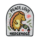 Weißer Peace, Love & Igel gießt Blumen Patch
