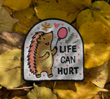 Igel Patch auf herbstlichen Blättern