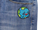 Erde Patch auf dunkelblauer Jeans