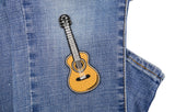 Gitarre Patch auf dunkelblauer Jeans