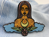 Kraft der Natur Patch auf heller Jeans