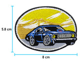 Auto im Sonnenuntergnag Patch mit der Maße: 5,8 x 8 cm
