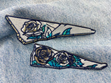 Glasscherben Patches auf blauer Jeans