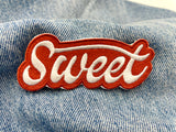 Sweet Patch auf blauer Jeans