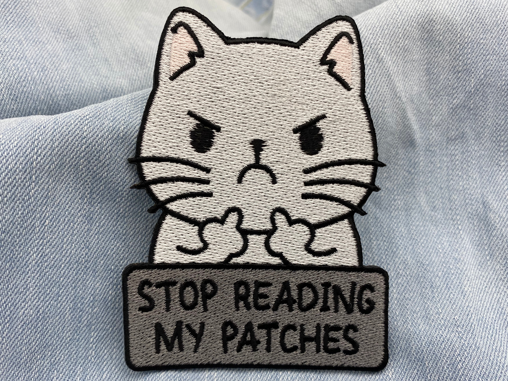 Katze Patch auf hellblauer Jeans