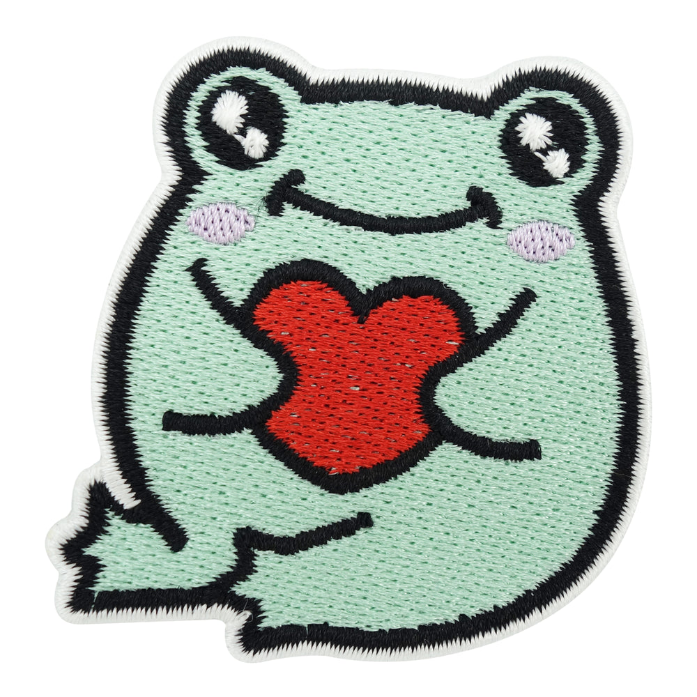 Grüner Frosch hält ein kleines Herz Patch