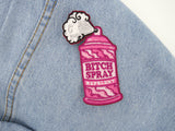 Sprühdosen Patch auf hellblauer Jeans