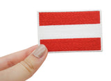 Österreich Klett Patch gehalten von einer Frauenhand
