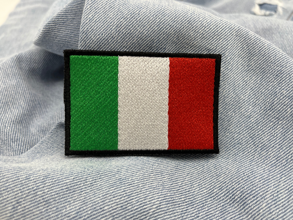 Italien Klettpatch auf hellblauer Jeans