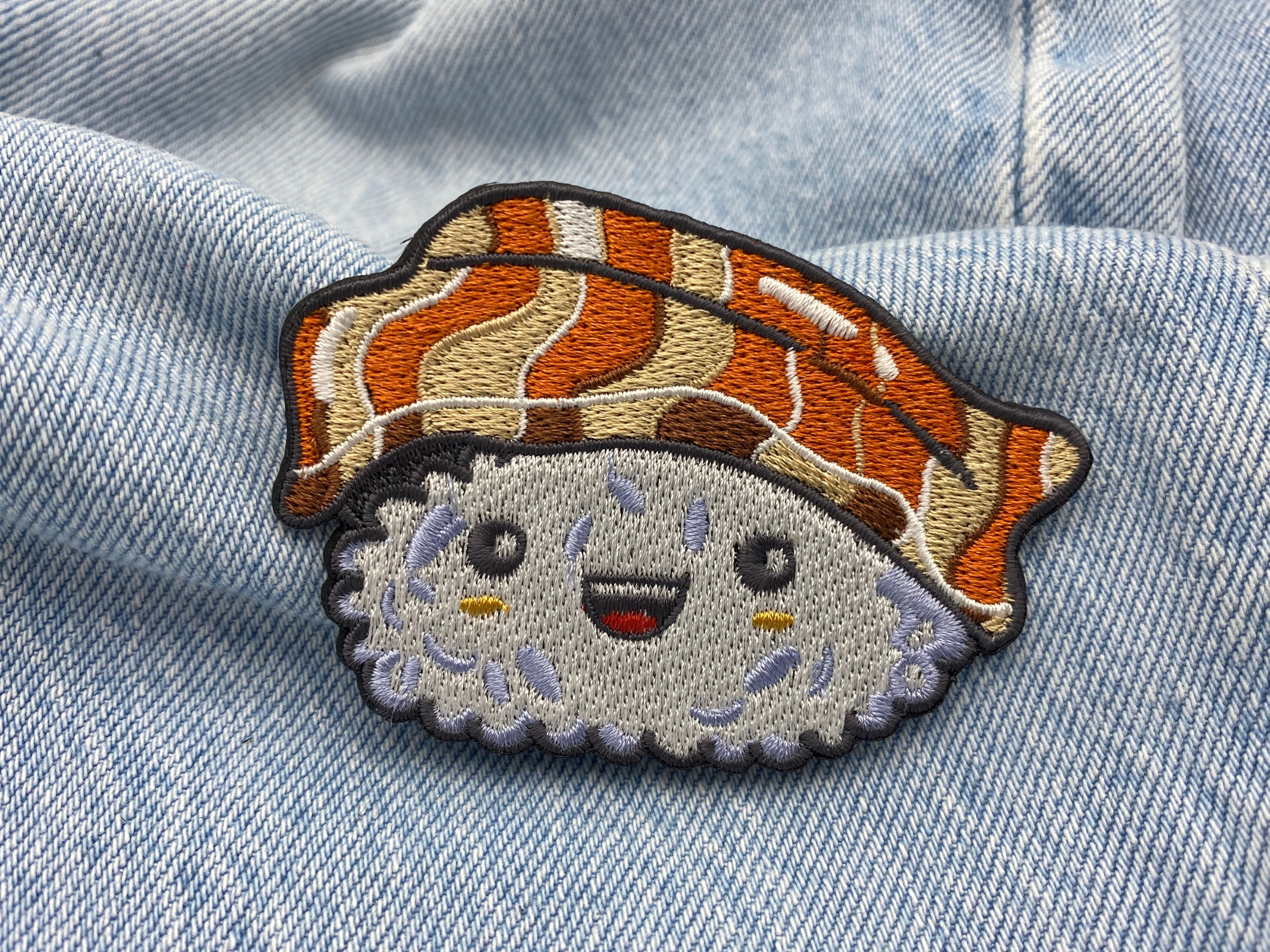 Der Patch auf blauer Jeans