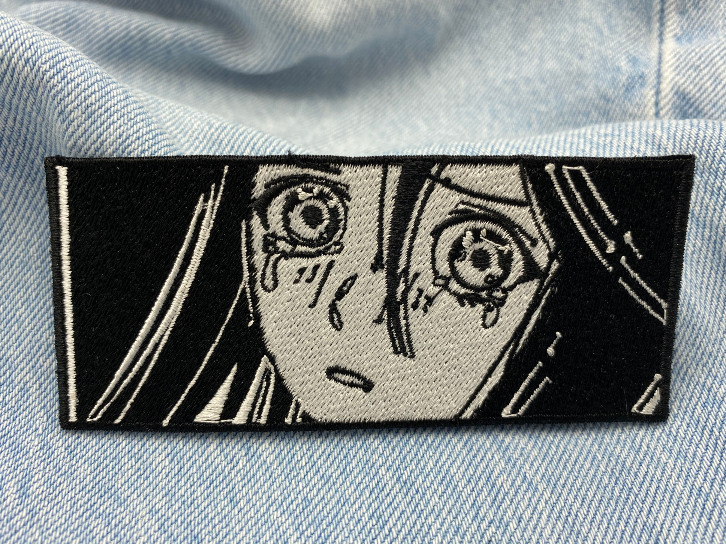 Patch auf blauer Jeans