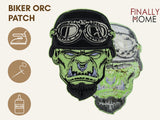  Ork Biker Patch von vorne und hinten mit Bügelfolie. Dargestellt sind auch "Finally Home" Logo und Verwendungsoptionen: Aufbügeln, Aufnähen, Aufkleben.