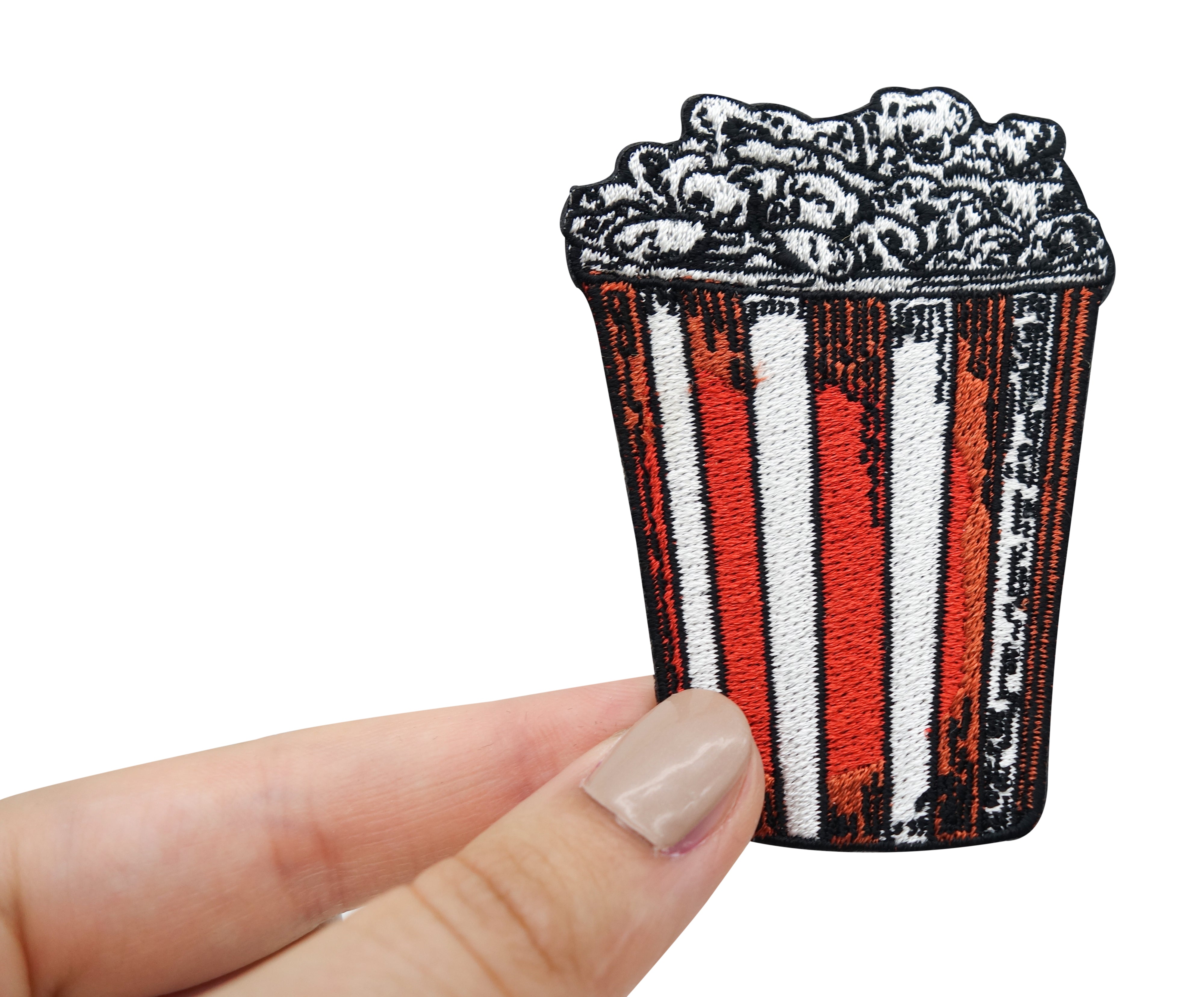 Popcorn Patch gehalten von einer Frauenhand