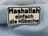 Spruch Patch auf einer blauen Jeans