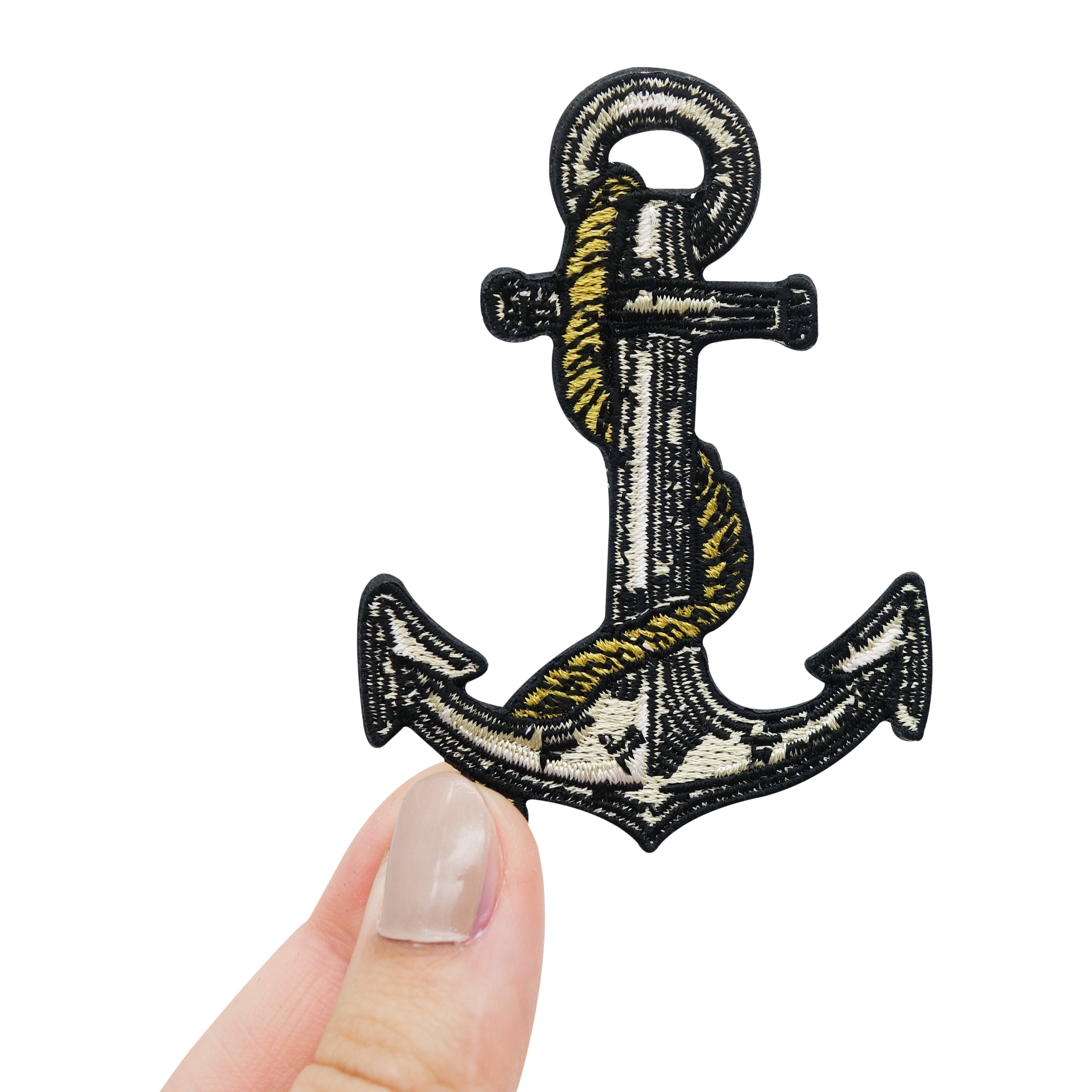 Frauenhand hält den Anker Patch 