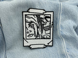 Der Patch auf blauer Jeans