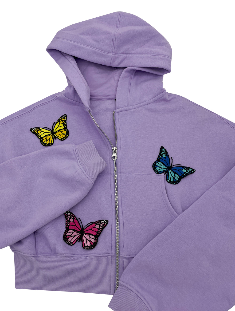 Verschieden farbige Schmetterling Patches auf violetter Jacke 