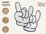 Vorder- und Rückseite des Patches, mit Bügelfolie. „Finally Home“ Logo und Nutzungsoptionen: Aufbügeln, Aufnähen, Aufkleben mit Textilkleber