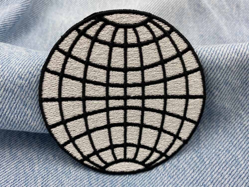 Erde Patch auf blauer Jeans