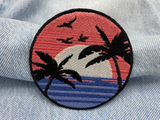 Sonnenuntergang Patch auf heller blauer Jeans