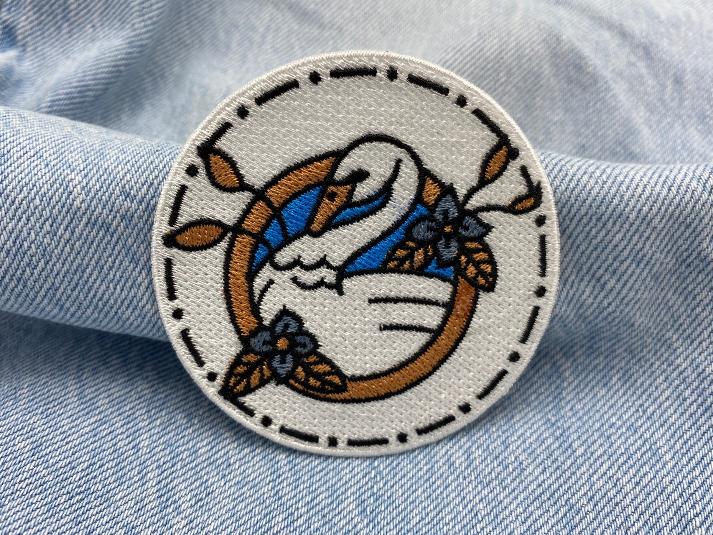 Schwan Patch auf blauer Jeans
