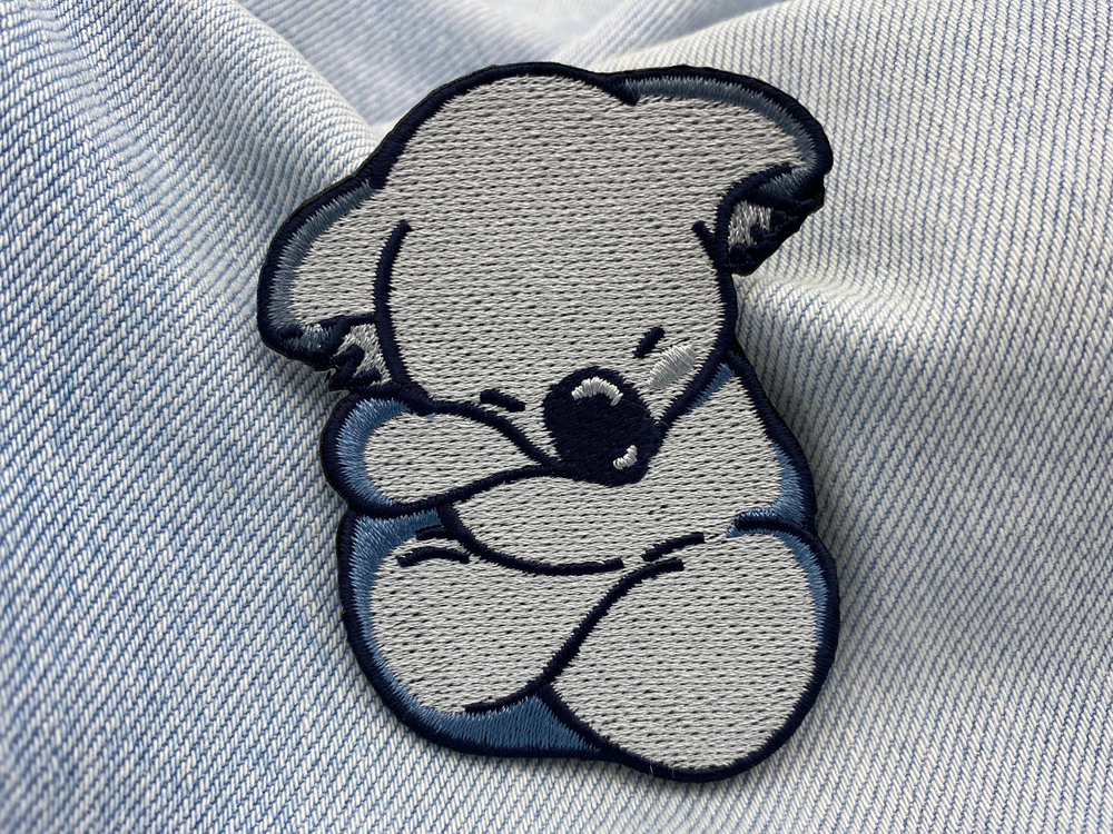 Koala Patch auf heller blauer Jeans