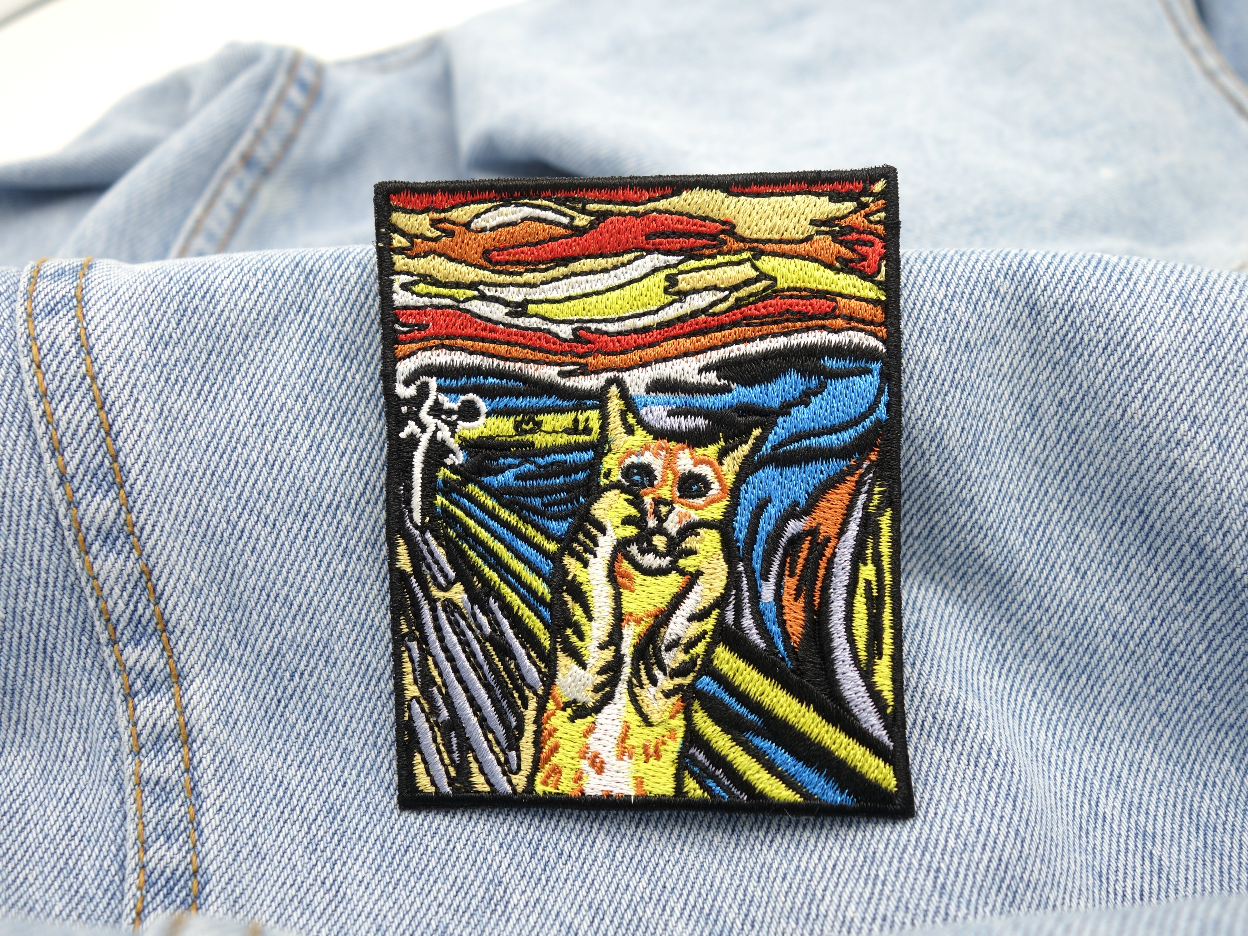Katzen Patch auf blauer Jeans