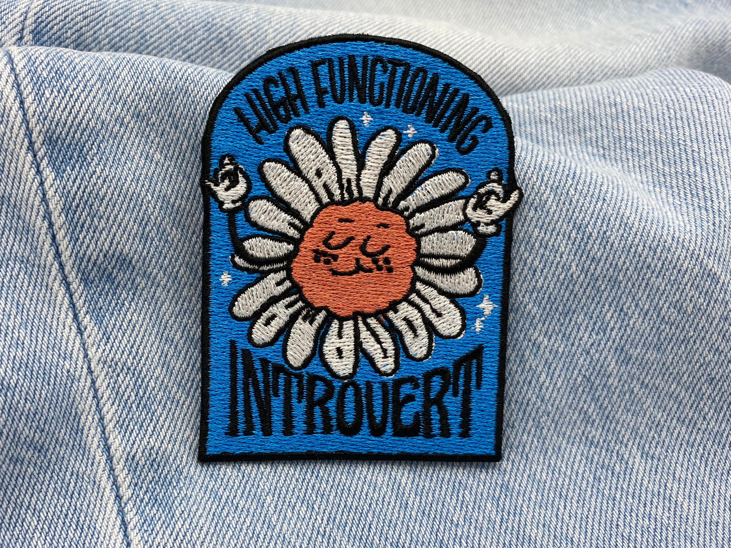 Blumen Spruch Patch auf blauer Jeans