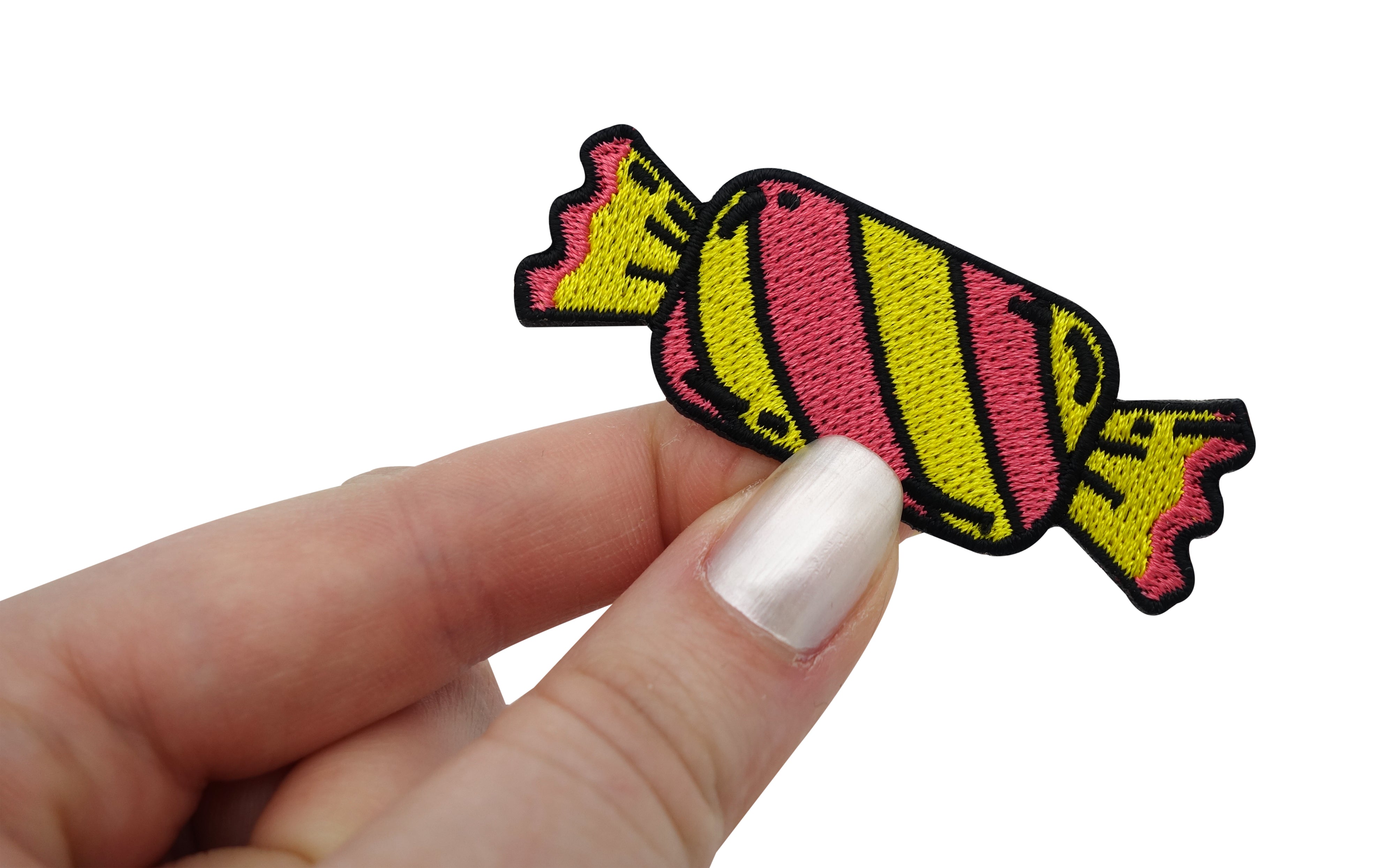 Bonbon Patch gehalten von einer Frauenhand