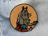 Pferd trinkt Kaffee Patch auf blauer Jeans