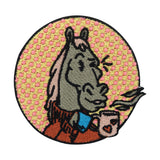 Rosa-gelber Pferd trinkt Kaffee Patch