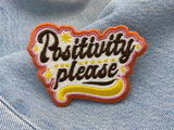 Positivity Patch auf blauer Jeans