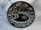 Angelnder Astronauten Patch auf blauer Jeans