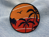 Sonnenuntergang Patch auf blauer Jeans