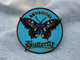 Schmetterling Patch auf blauer Jeans