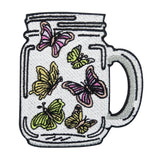 Bunte Schmetterlinge im Glas Patch