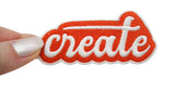 Frauenhand hält den create Patch