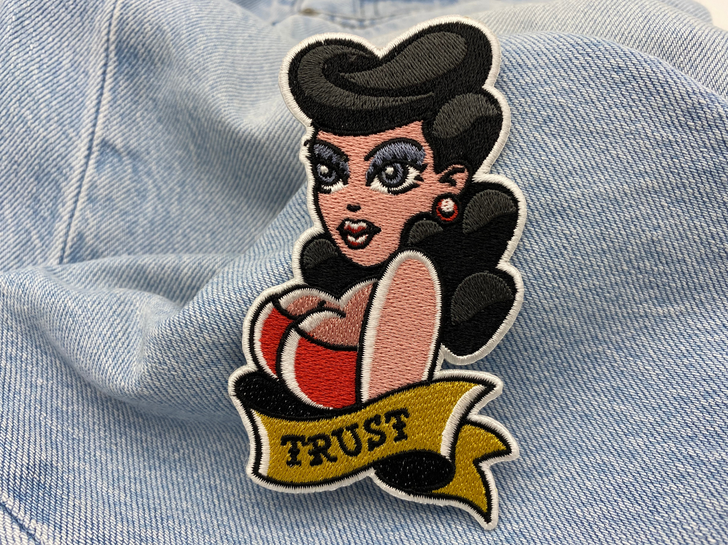 Sexy Frau Patch auf blauer Jeans