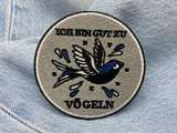Vogel Patch auf hellblauer Jeans